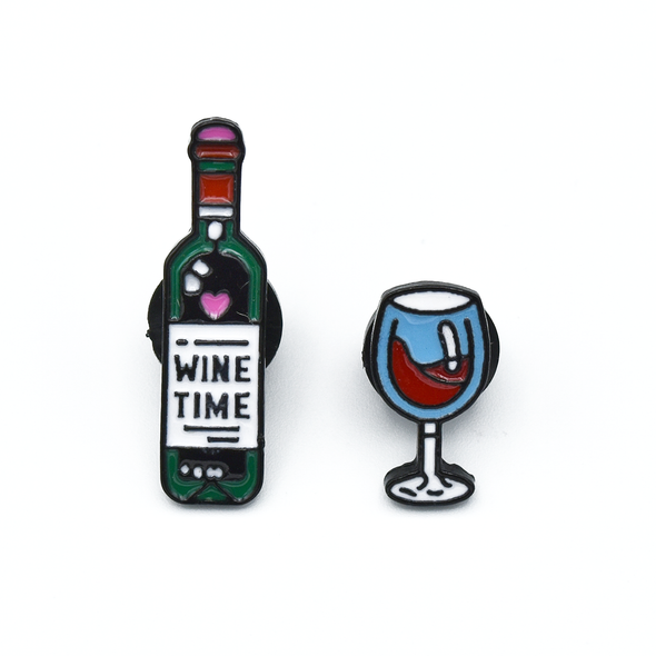 Set of two enamel pins, including bottle of wine enamel pin with Wine Time text on label and turquoise and red wine glass pin