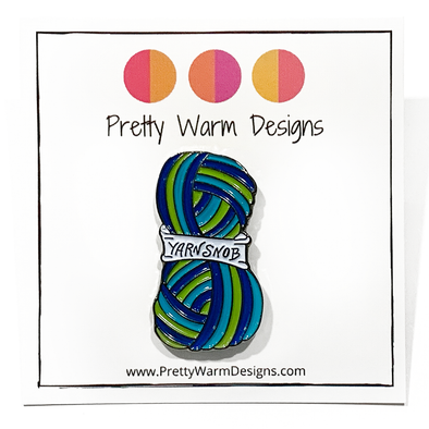 Blue, green and white enamel on silver metal Yarn Snob pin for knitting and crochet project bags by Pretty Warm Designs