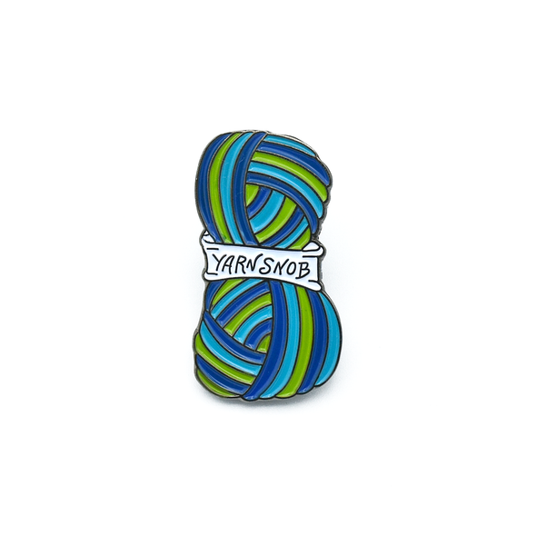 Blue, green and white enamel on silver metal Yarn Snob pin for knitting and crochet project bags by Pretty Warm Designs