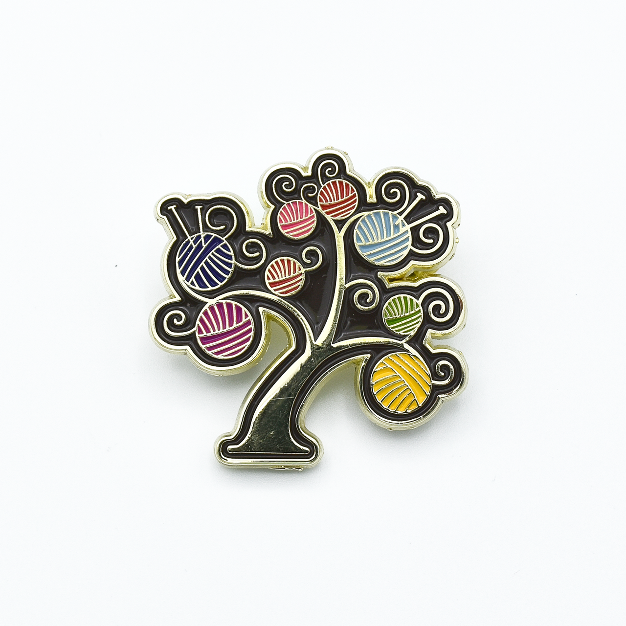 Multicoloured enamel on gold metal yarn tree pin for knitting project bags by Pretty Warm Designs