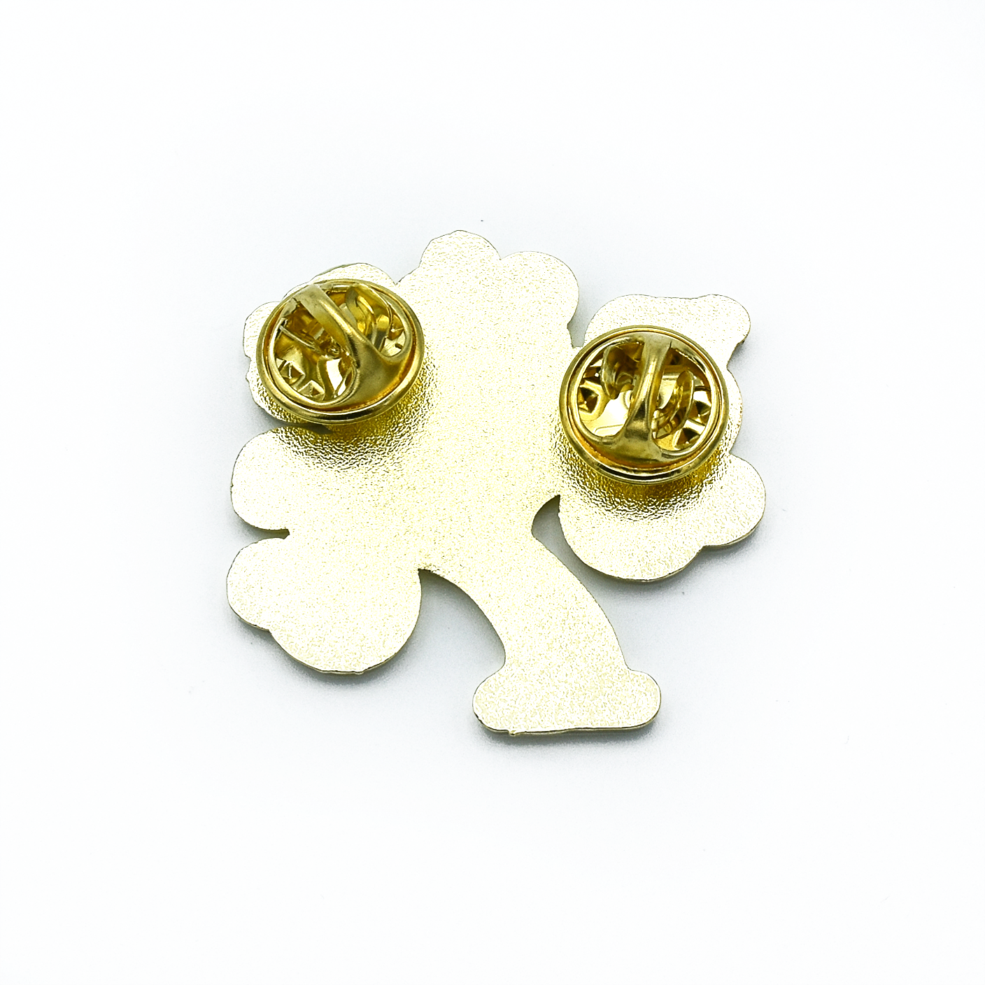 Back of multicoloured enamel on gold metal yarn tree pin for knitting project bags by Pretty Warm Designs