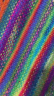 Video of six silver and glitter enamel pet paw charms snag free ring stitch markers held on knitting needle by woman's hand with multicoloured knitting in the background by Pretty Warm Designs