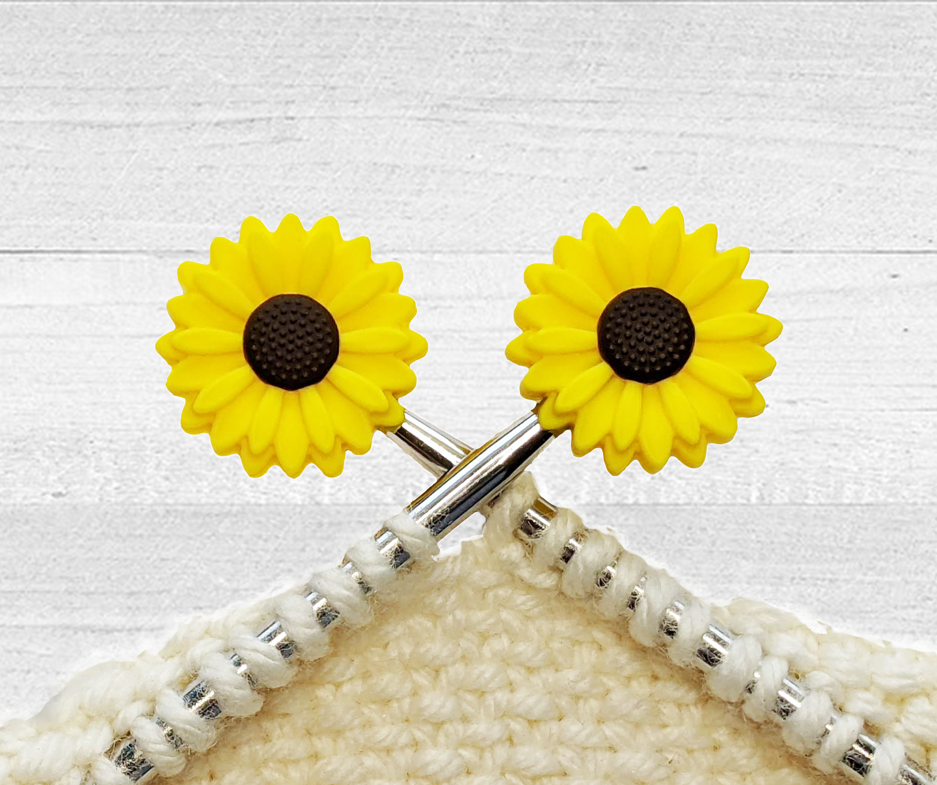 Set of two sunflower stitch stoppers for knitting